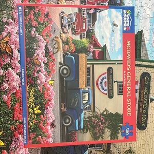 White Mountain Modavid's General Store Puzzle - Vibrant Red and Blue